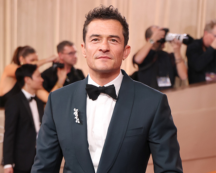 Orlando Bloom on a red carpet, taking aim at his ex-wife Katy Perry.
