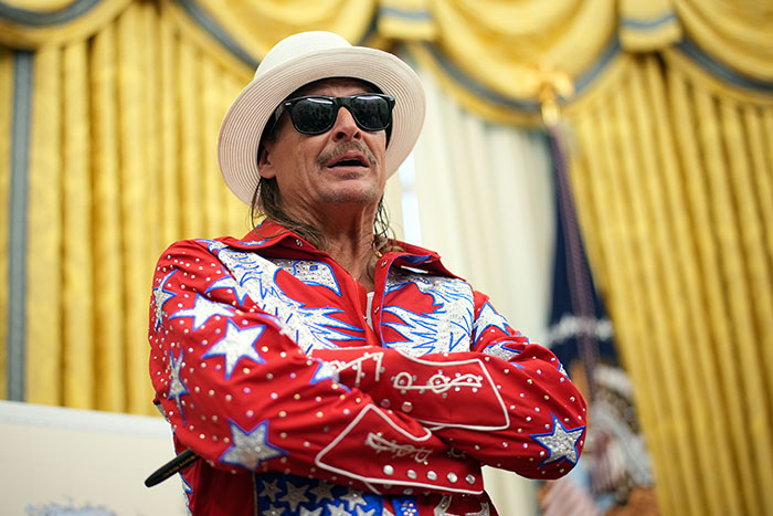 Kid Rock in patriotic red white and blue outfit at Freedom 250 event