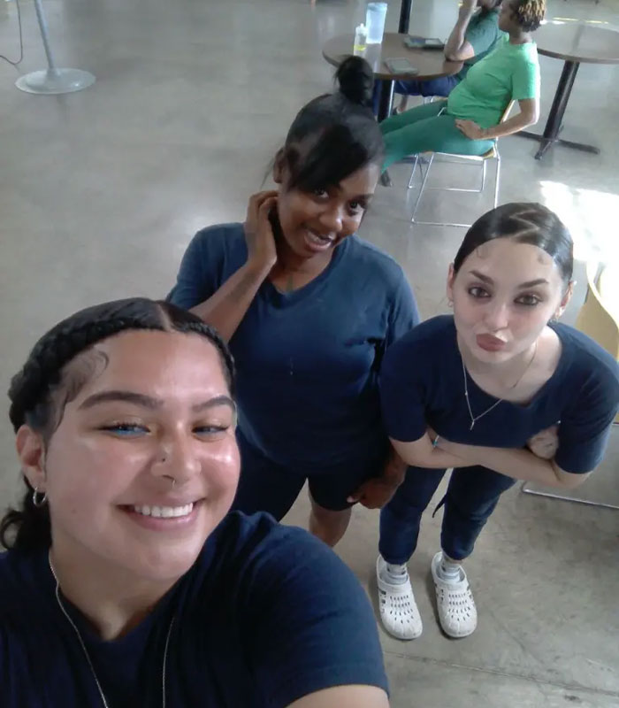 Group selfie of Mackenzie Shirilla’s friends smiling indoors Group selfie of Mackenzie Shirilla’s friends smiling indoors