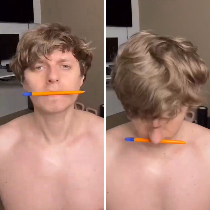 Man performing daily jaw exercises with pen between lips for transformation