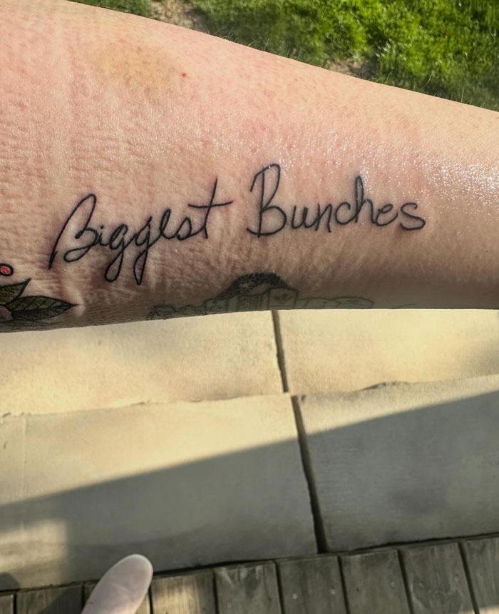 Leg tattoos featuring the script Biggest Bunches, conveying a meaningful message.