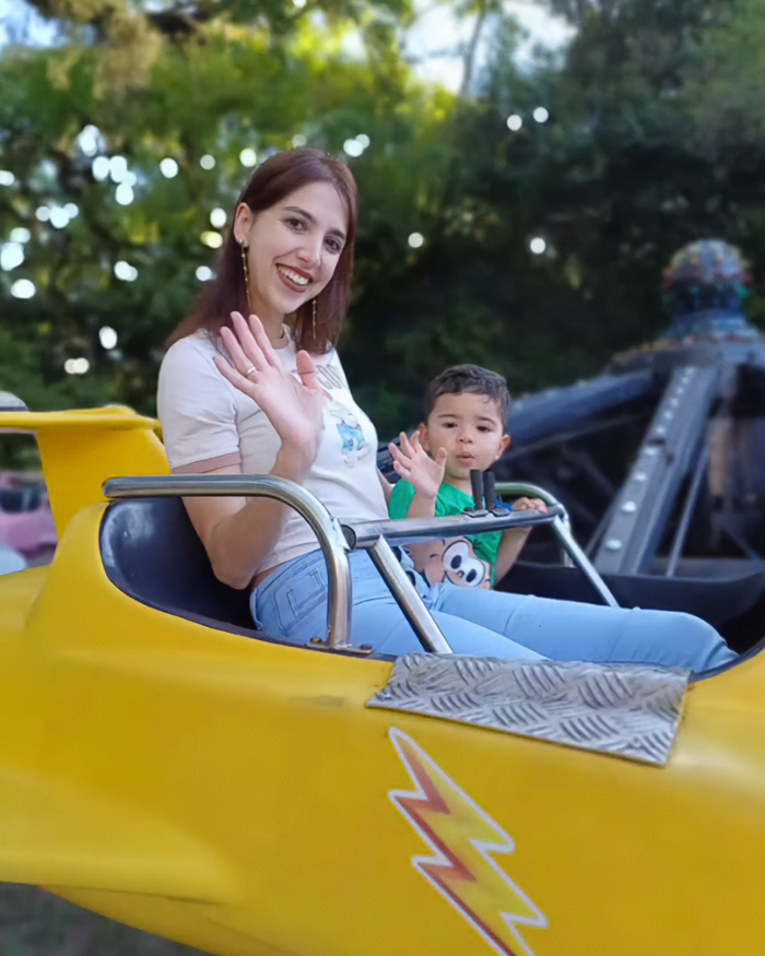 Mom and son wave from a yellow ride, before mom hid audio recorder, noticing changed behavior.