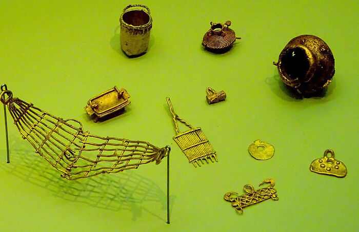 Various golden artifacts displayed, showcasing the types of lost treasures worth billions that history researchers seek.