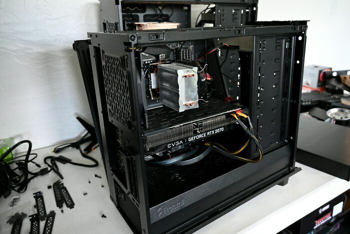 Open computer case showing GeForce RTX 2070 graphics card for satisfying PC build