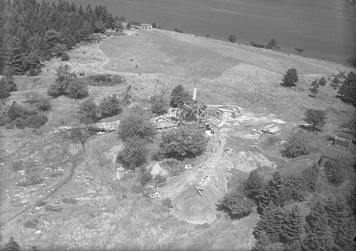An aerial view of a remote, destroyed site, possibly an archaeological dig for lost treasures worth billions.