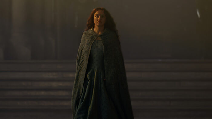 House of the Dragon season 3 premiere: A woman with long red hair walks in a dark, ominous hallway, stirring boycott threats. House of the Dragon season 3 premiere: A woman with long red hair walks in a dark, ominous hallway, stirring boycott threats.