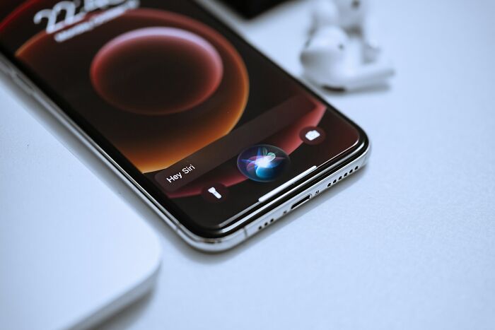 A smartphone displaying Siri, possibly hinting at how legal insiders might share wild courtroom stories.
