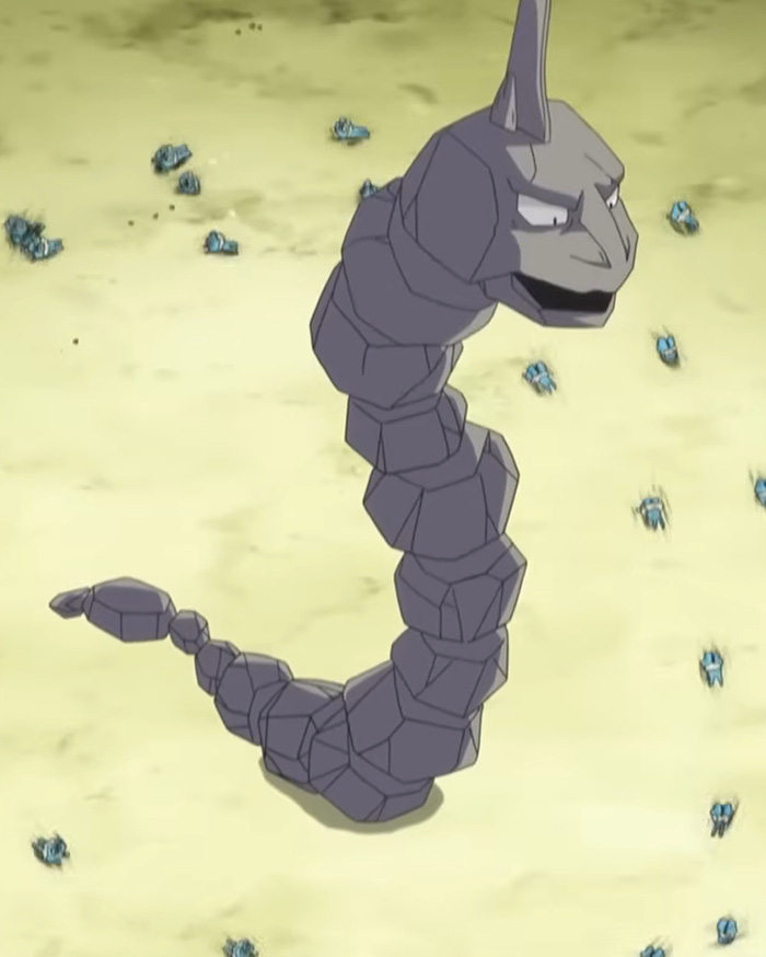 Animated image of Onyx Pokemon in a sandy environment Animated image of Onyx Pokemon in a sandy environment