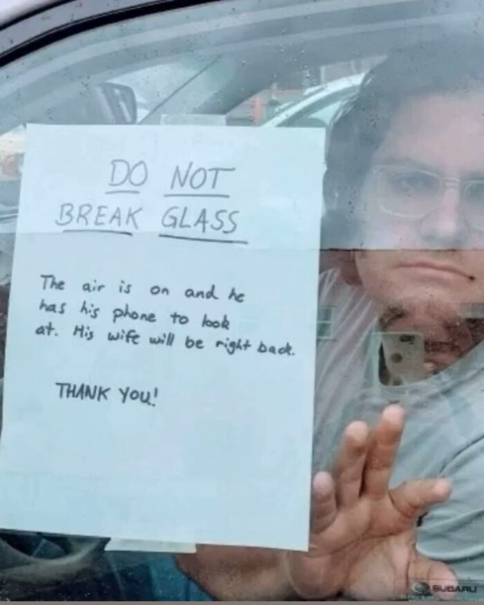 Parenting meme with a man in car and note saying not to break glass as wife will return soon