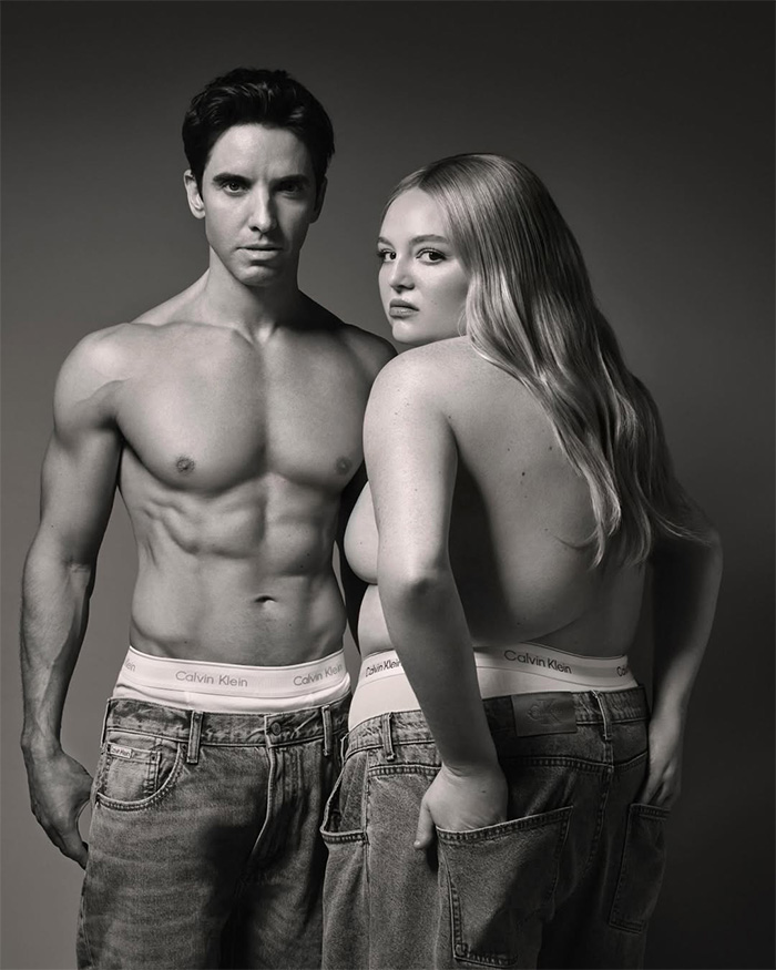 Paul W. Downs and woman recreating Mark Wahlberg Calvin Klein ad in black and white Paul W. Downs and woman recreating Mark Wahlberg Calvin Klein ad in black and white