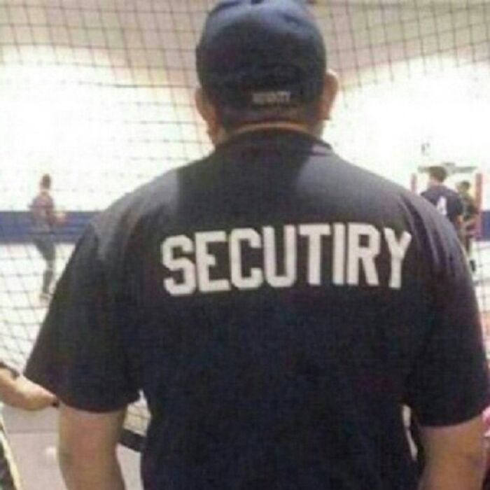 A man from behind wearing a t-shirt with the word SECUTIRY misspelled, illustrating a “You Had One Job” fail.
