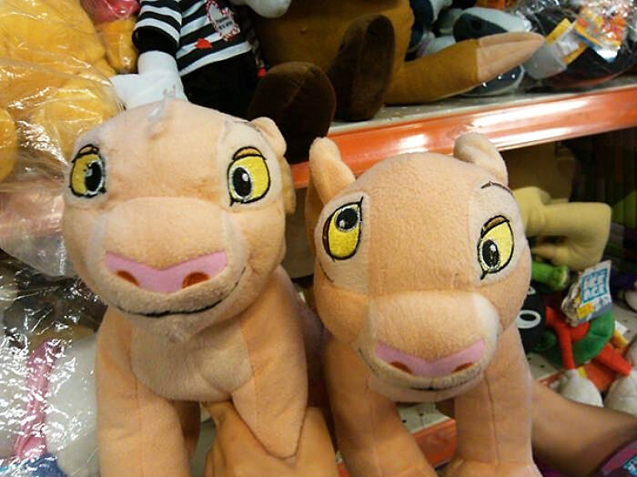 Two plush toys of Nala with poorly stitched eyes, a ridiculous You Had One Job fail showcasing lack of common sense.