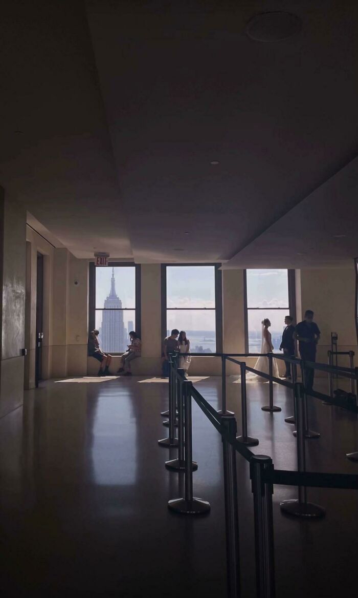 A wholesome photo trend of strangers captured like a painting, with a skyline view.