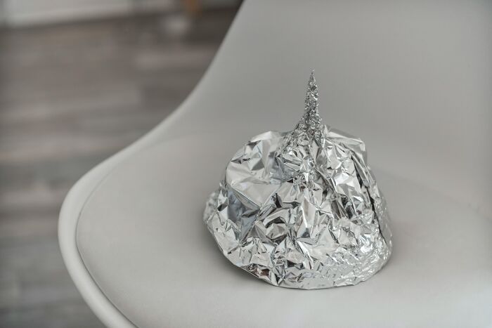 Tin foil hat symbolizing paranoia after reconnecting with old friends