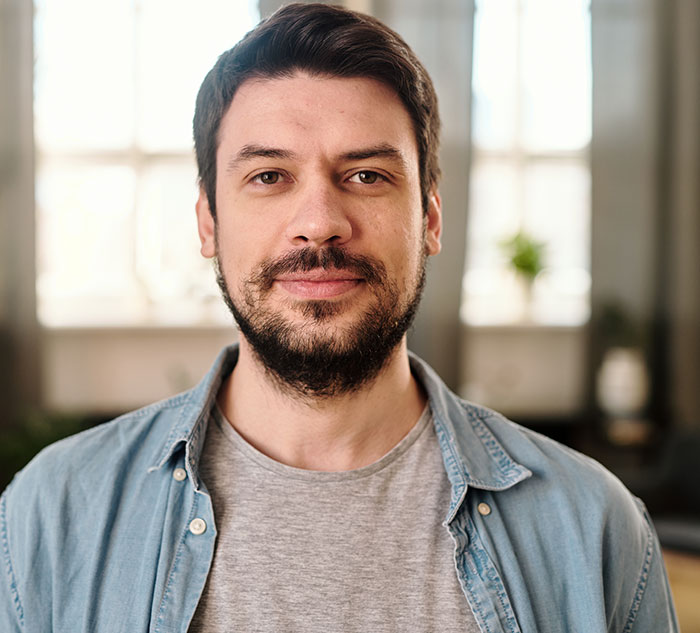 Man with beard and casual clothes representing strange jobs