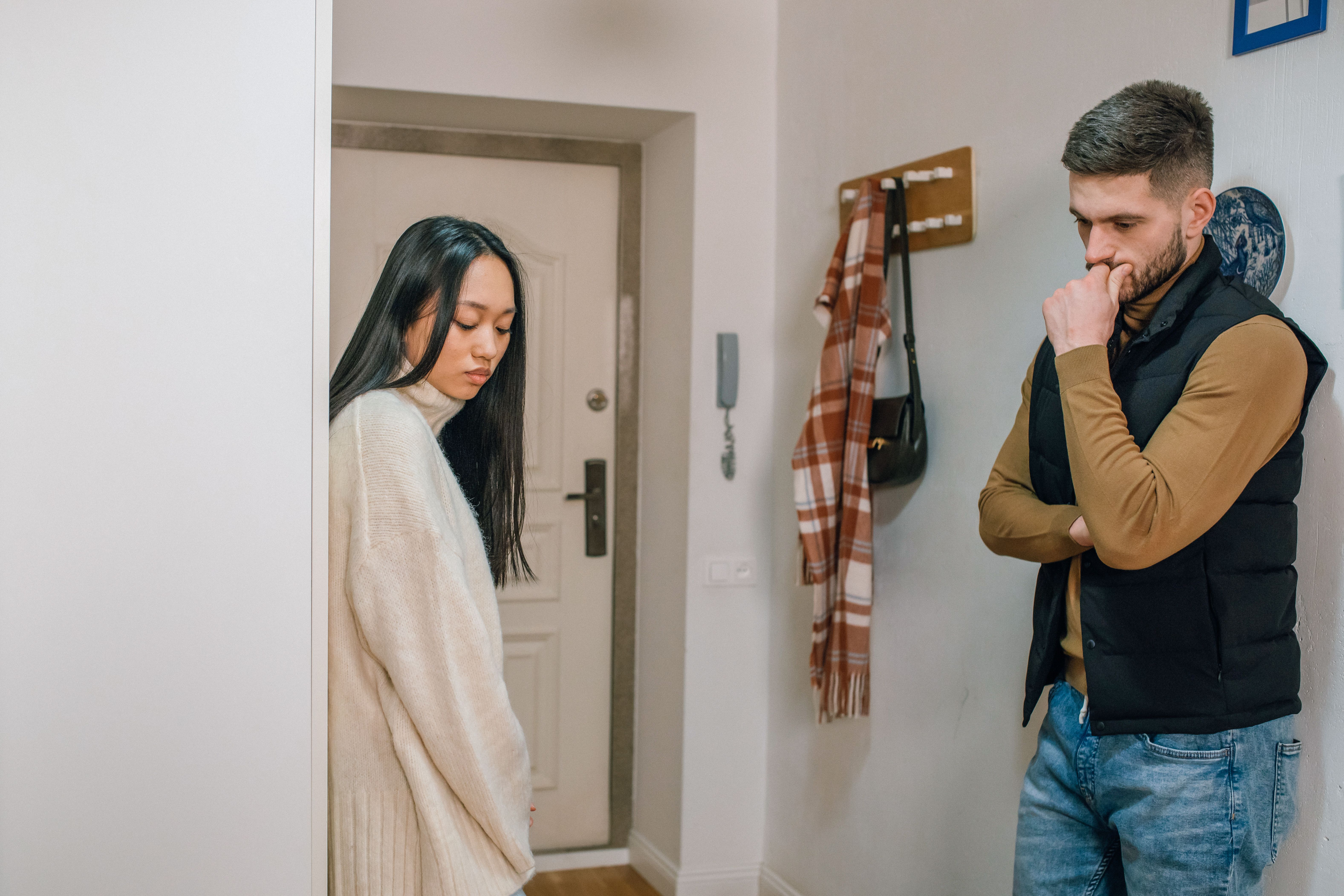 Couple in conflict illustrating wedding plans disrupted by mother in law
