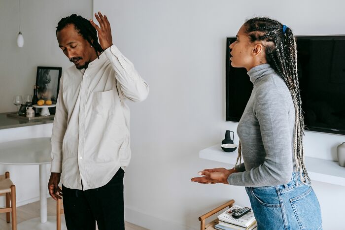 Couple arguing indoors capturing moments men realized their lives would never be the same