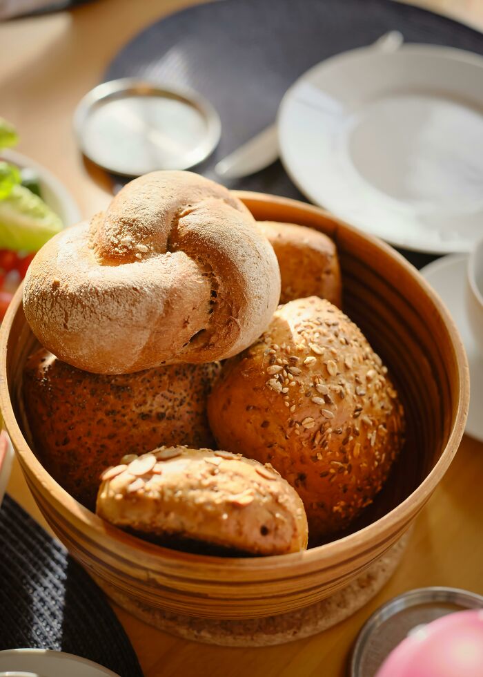 Basket of assorted bread rolls for British breakfast