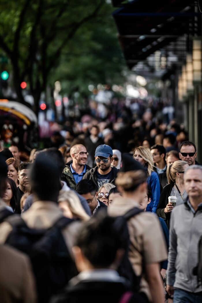 A crowded city street, depicting diverse human bodies. Delve into fascinating NSFW facts about human bodies.
