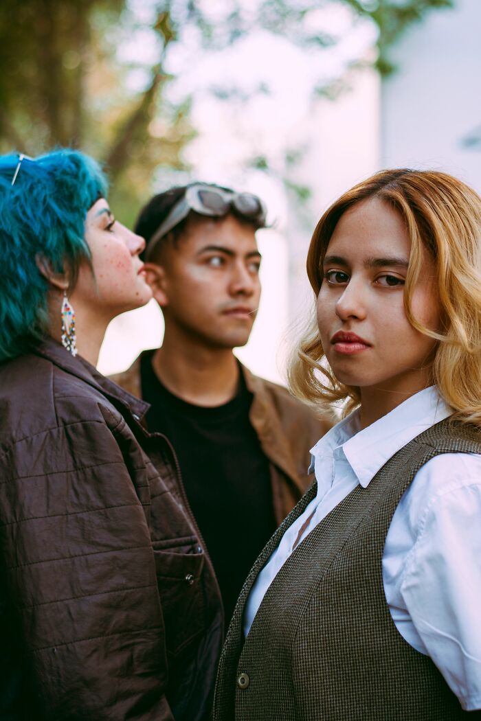 Three people showing relationship tension in a cheating and complete idiots story