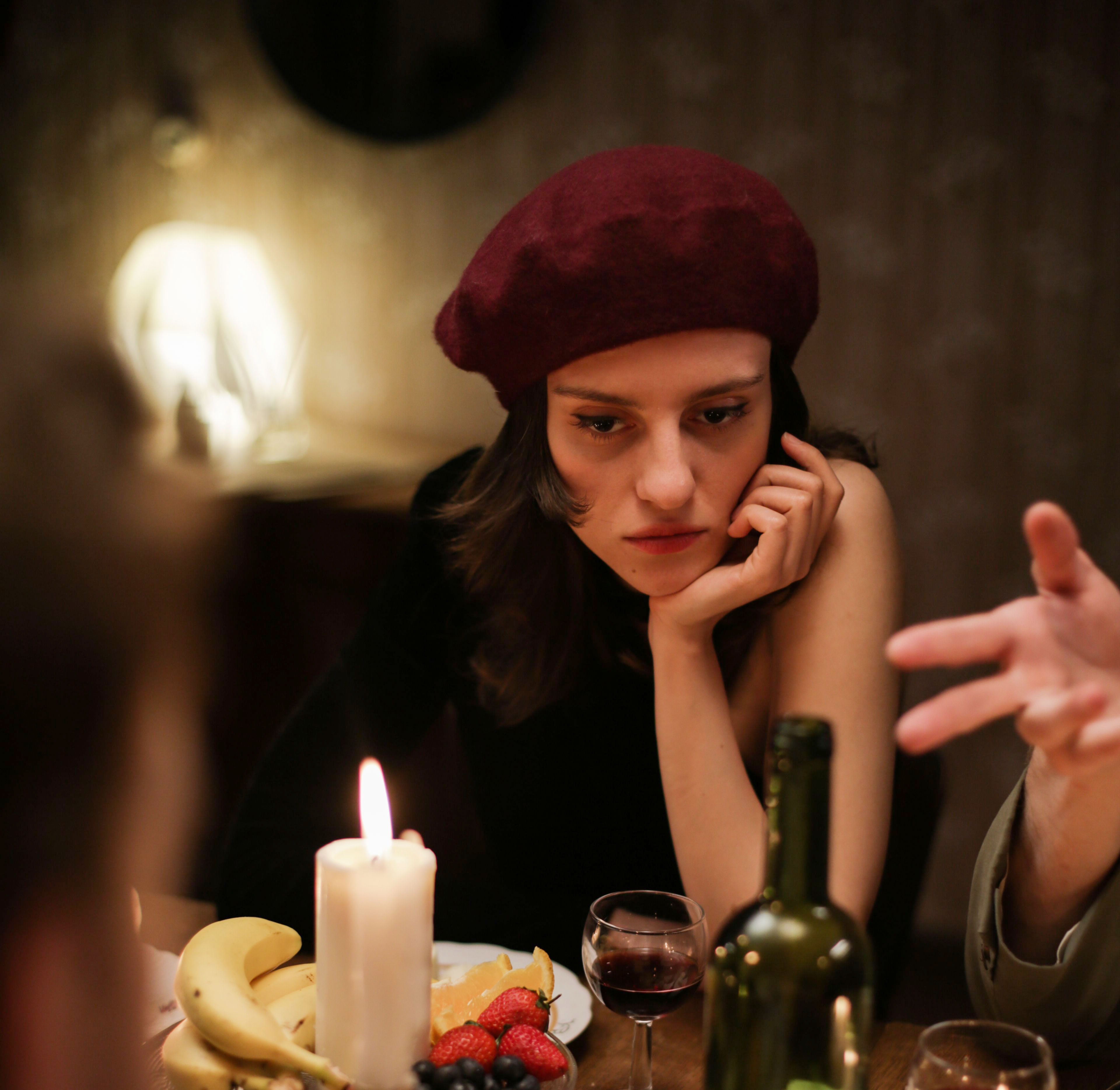 A thoughtful bride in a beret at the rehearsal dinner, reflecting on the MIL turning it into a spectacle. A thoughtful bride in a beret at the rehearsal dinner, reflecting on the MIL turning it into a spectacle.