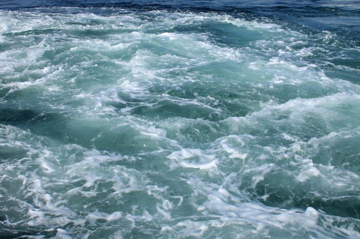 Turbulent ocean water surface for diving scene