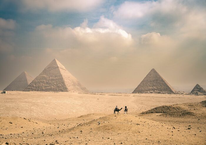 The Great Pyramids of Giza, ancient structures that are part of the world's solved mysteries.