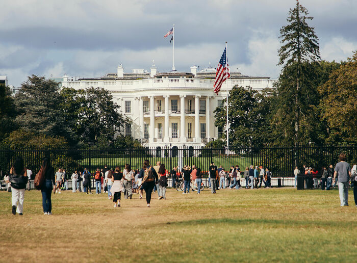 Crowd gathered outside the White House, symbolizing secrecy around medical history
