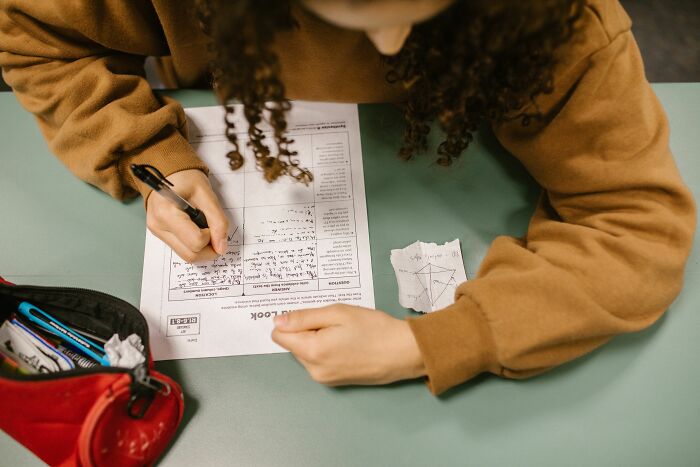 Student working on math and science questions to beat the average U.S. student test Student working on math and science questions to beat the average U.S. student test