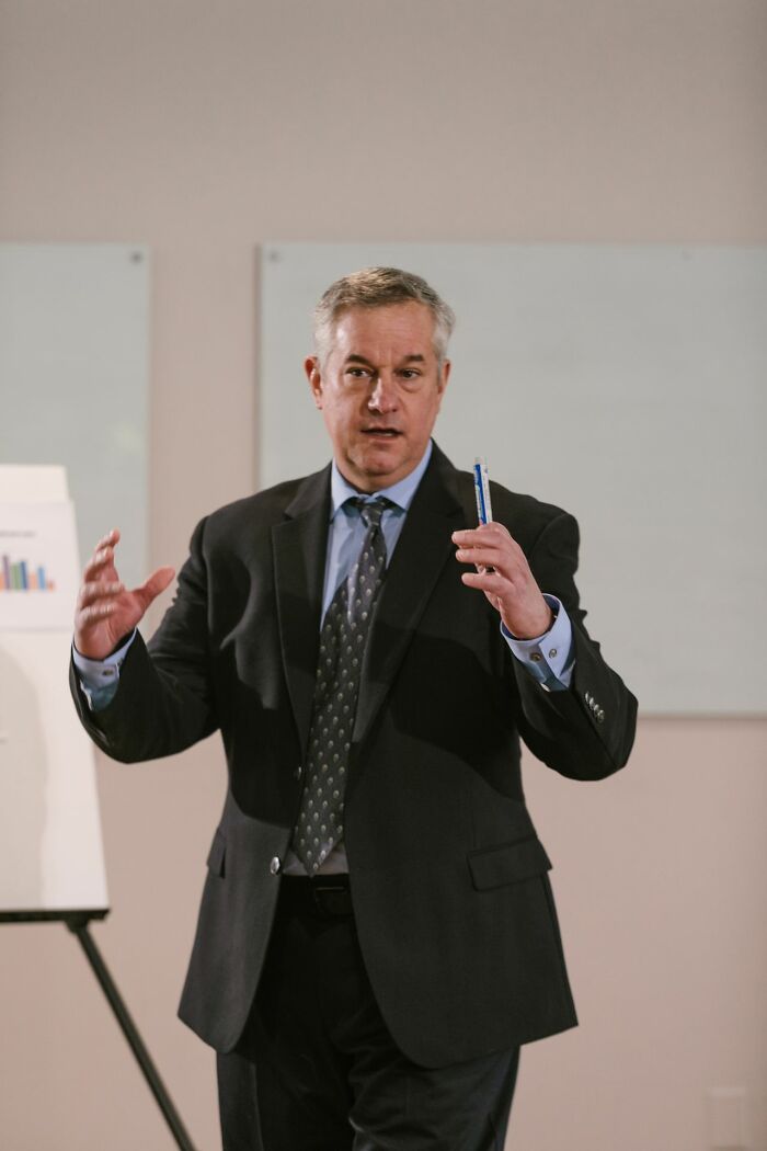 A lawyer presenting in a courtroom, sharing wild legal insider stories.