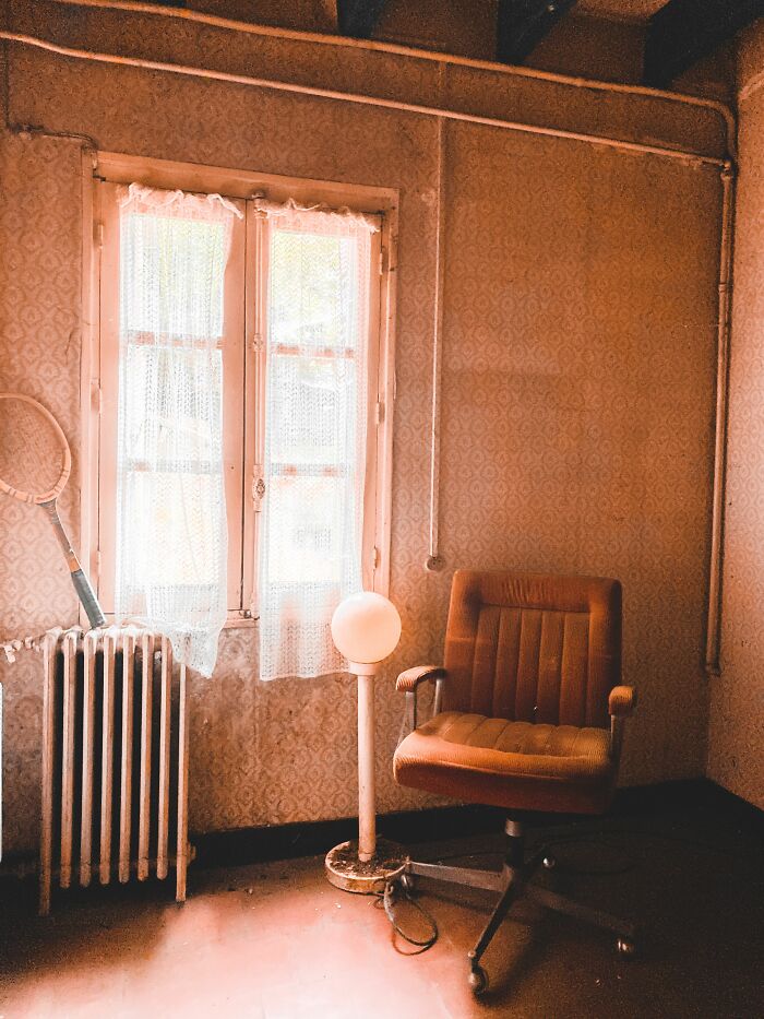 A room with a window, a chair, and a radiator, evoking stories about people who hid their true selves.