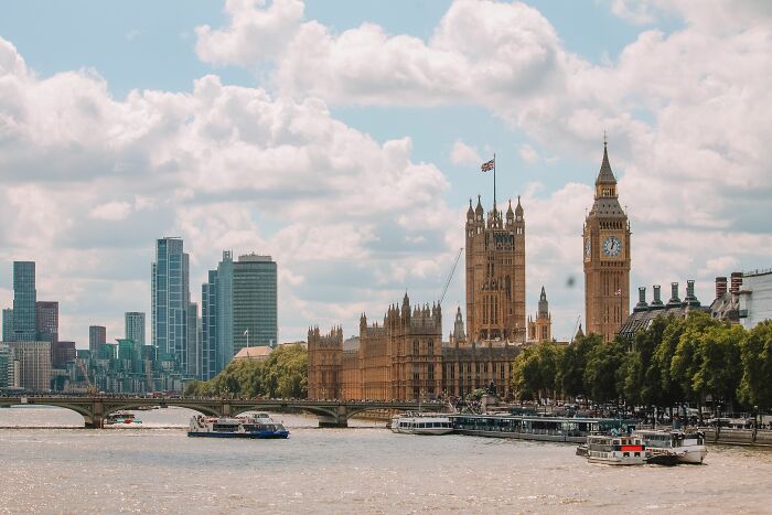 A beautiful photo of the Houses of Parliament and Big Ben in London, a famous capital city, with the River Thames in the foreground. This image makes one guess capital cities based on two clues, testing one's geography knowledge. A beautiful photo of the Houses of Parliament and Big Ben in London, a famous capital city, with the River Thames in the foreground. This image makes one guess capital cities based on two clues, testing one's geography knowledge.
