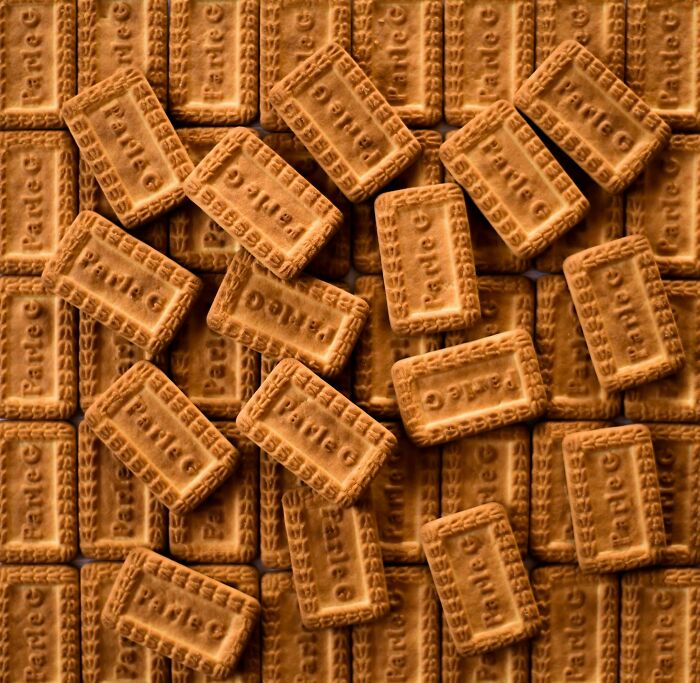 Stack of rectangular cookies with detailed surface pattern