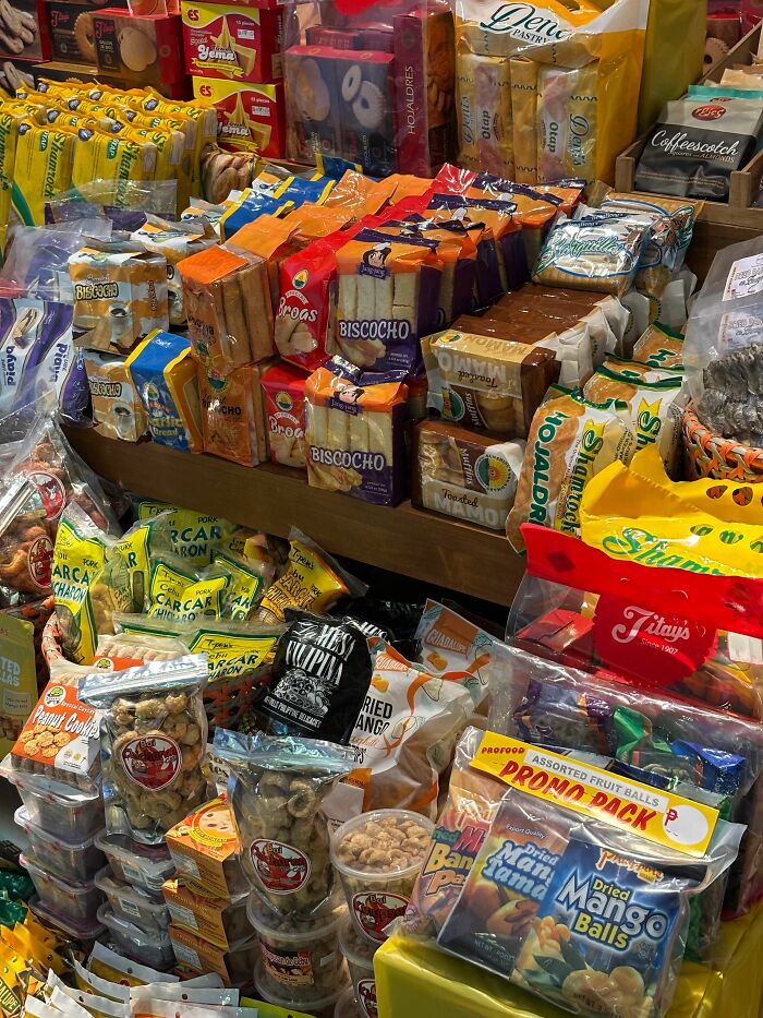 A stall brimming with various packaged snacks, representing common misunderstandings between locals and foreigners.