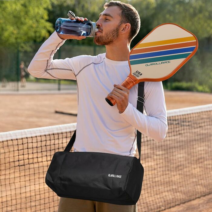 Man holding pickleball paddle and water bottle with bag for Father's Day gift