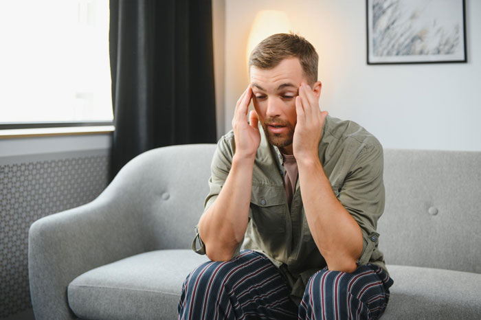 Man looking stressed, contemplating his picky eater girlfriend and their relationship. Man looking stressed, contemplating his picky eater girlfriend and their relationship.