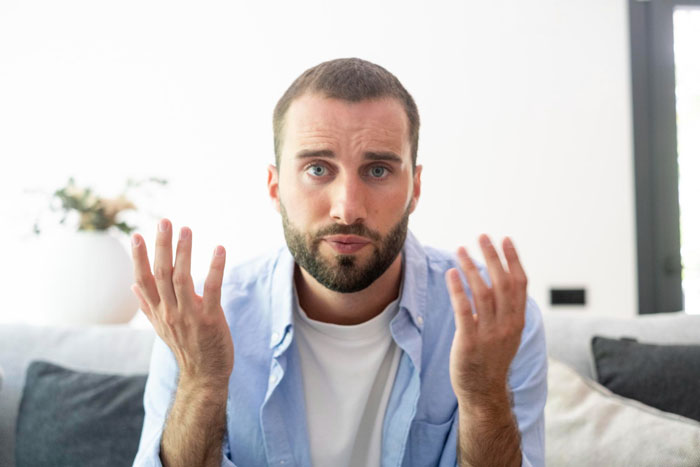 Man confused by his picky eater girlfriend in a relationship discussion. Man confused by his picky eater girlfriend in a relationship discussion.