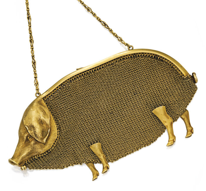 A gold pig-shaped chainmail purse, one of many interesting objects that are still intact after all these years.