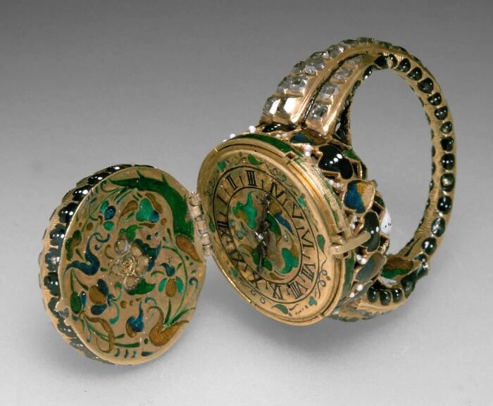 A gold and enamel ring watch, one of the interesting objects that are still intact after all these years.