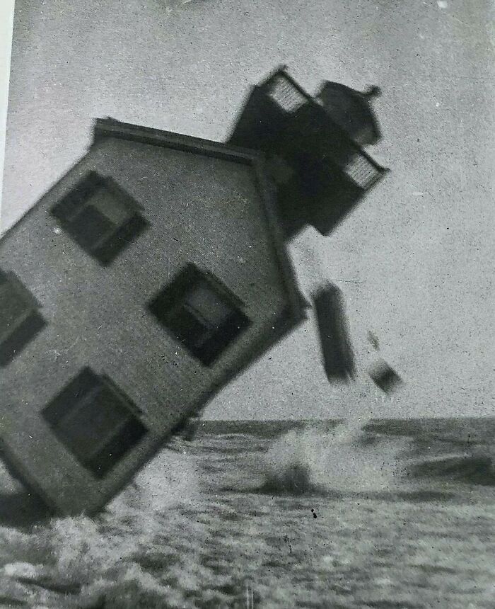 Vintage photo of a house falling into the sea, an interesting photo of intact objects.