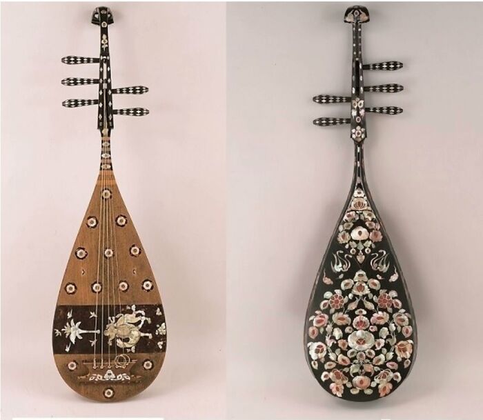 Two ornate pipa instruments, still intact after many years.