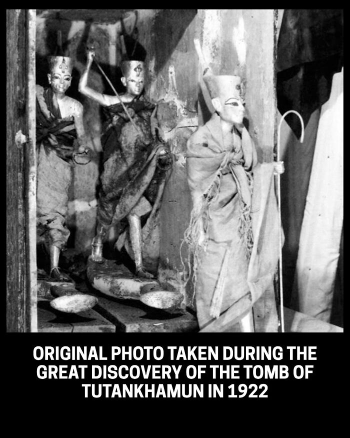 An original historical photo from 1922 showing statues found during the discovery of Tutankhamun's tomb.