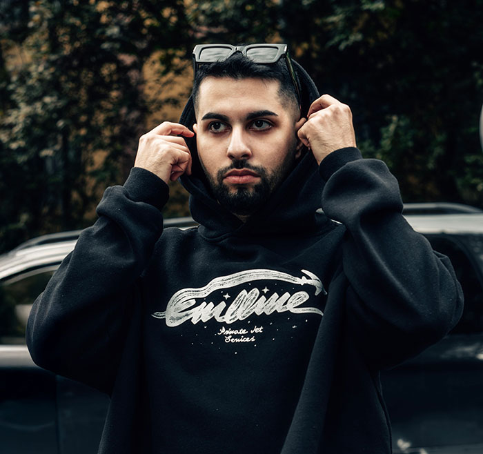 A man adjusting his hood, representing true crime fans realizing something was seriously wrong.