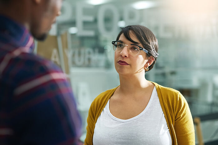 Woman serious confrontation with man in office petty revenge