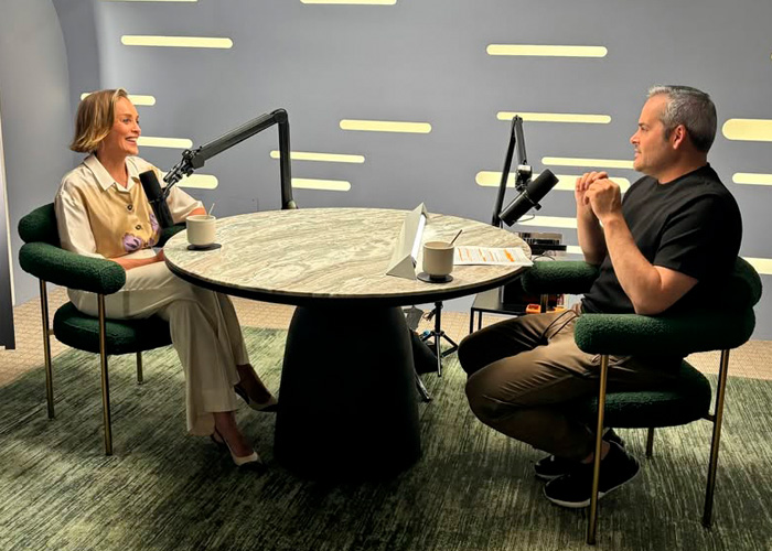 Sharon Stone and interviewer discussing surgery story in podcast studio