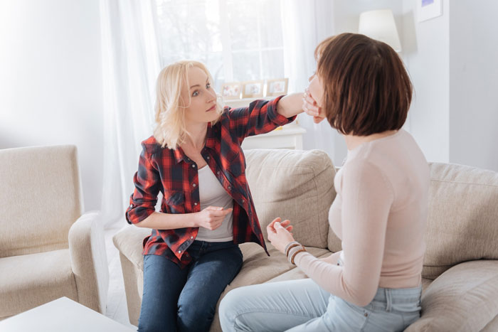 Woman confronting another in heated narcissistic MIL conflict Woman confronting another in heated narcissistic MIL conflict