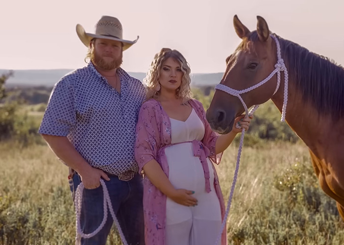 A pregnant woman and a man in a cowboy hat with a horse, part of the story of Taylor Parker's gruesome details.