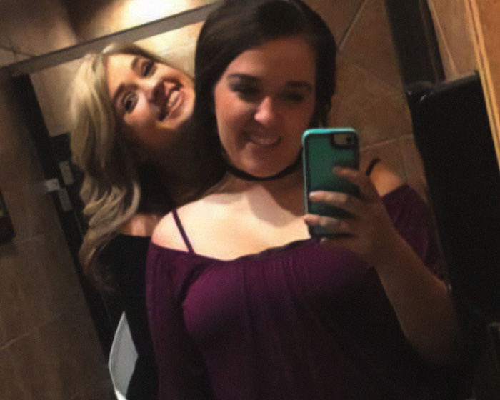 Two smiling young women taking a selfie, relevant to the gruesome details of Taylor Parker's story.