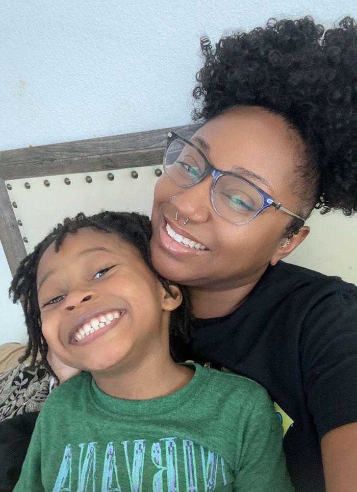 Smiling mother and child selfie highlighting student classroom supplies issue