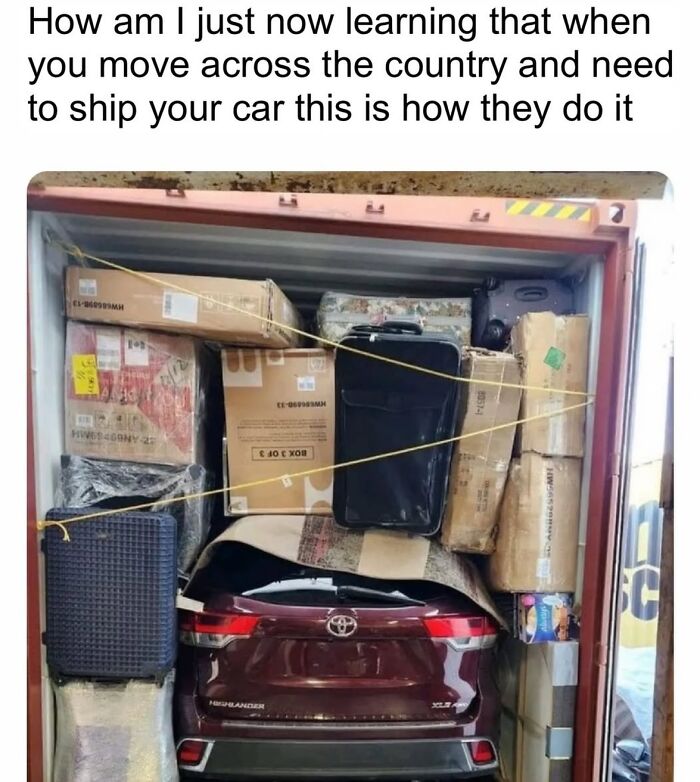 Car shipping method shown by tightly packed boxes and luggage with SUV inside container